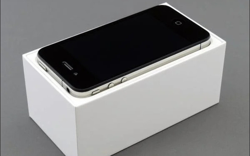 Image of a smartphone in its original box